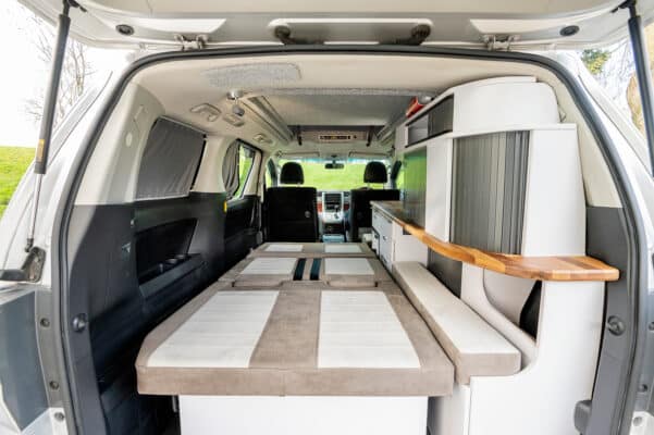 Toyota Alphard Connect II Campervan interior from rear with bed down