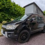 Mitsubishi Delica Terrain 4WD black with roof up