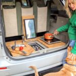 Toyota Hybrid Eco Escape with rear kitchen cooking lady dog