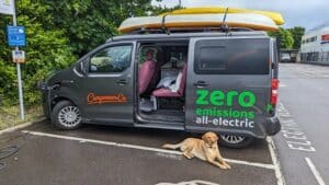 Electric Eco Revolution Camper charging at supermarket