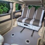 Toyota Alphard Hybrid Eco Explorer ZME white living area with no table