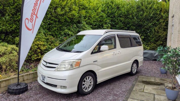 Toyota Alphard Hybrid Eco Explorer ZME white living area with roof down