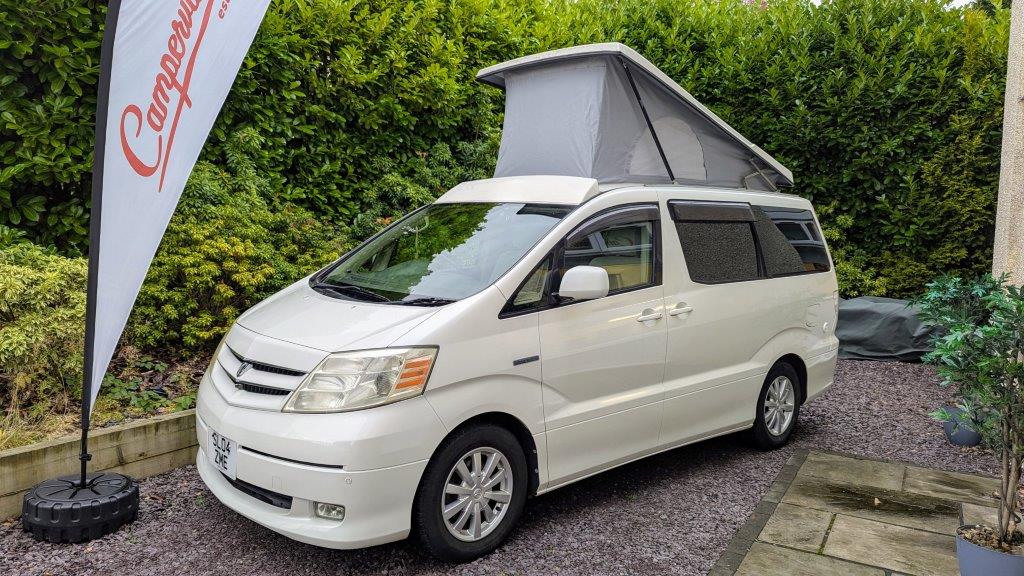 Toyota Alphard Hybrid Eco Explorer ZME white with roof up from front