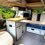 Toyota Hybrid Eco Pioneer white nxo interior with dining table