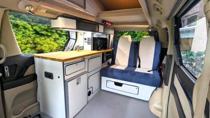 Toyota Hybrid Eco Pioneer white nxo living area with bed up no table