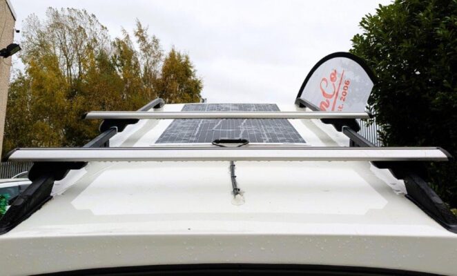 Toyota Hybrid Eco Pioneer white nxo solar panel and roof bars